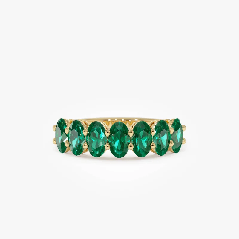 14k Oval Shaped Basket Setting Emerald Ring