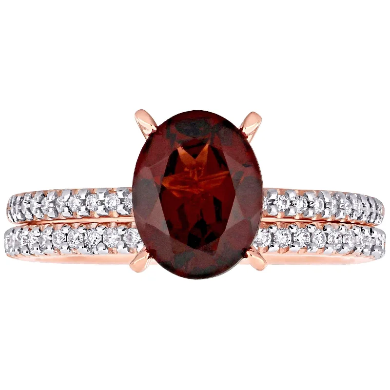 Miadora 14k Rose Gold Oval-cut Garnet and 1/4ct TDW Diamond Solitaire Bridal Ring Set