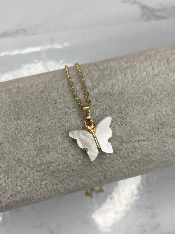 White fluttering butterfly necklace